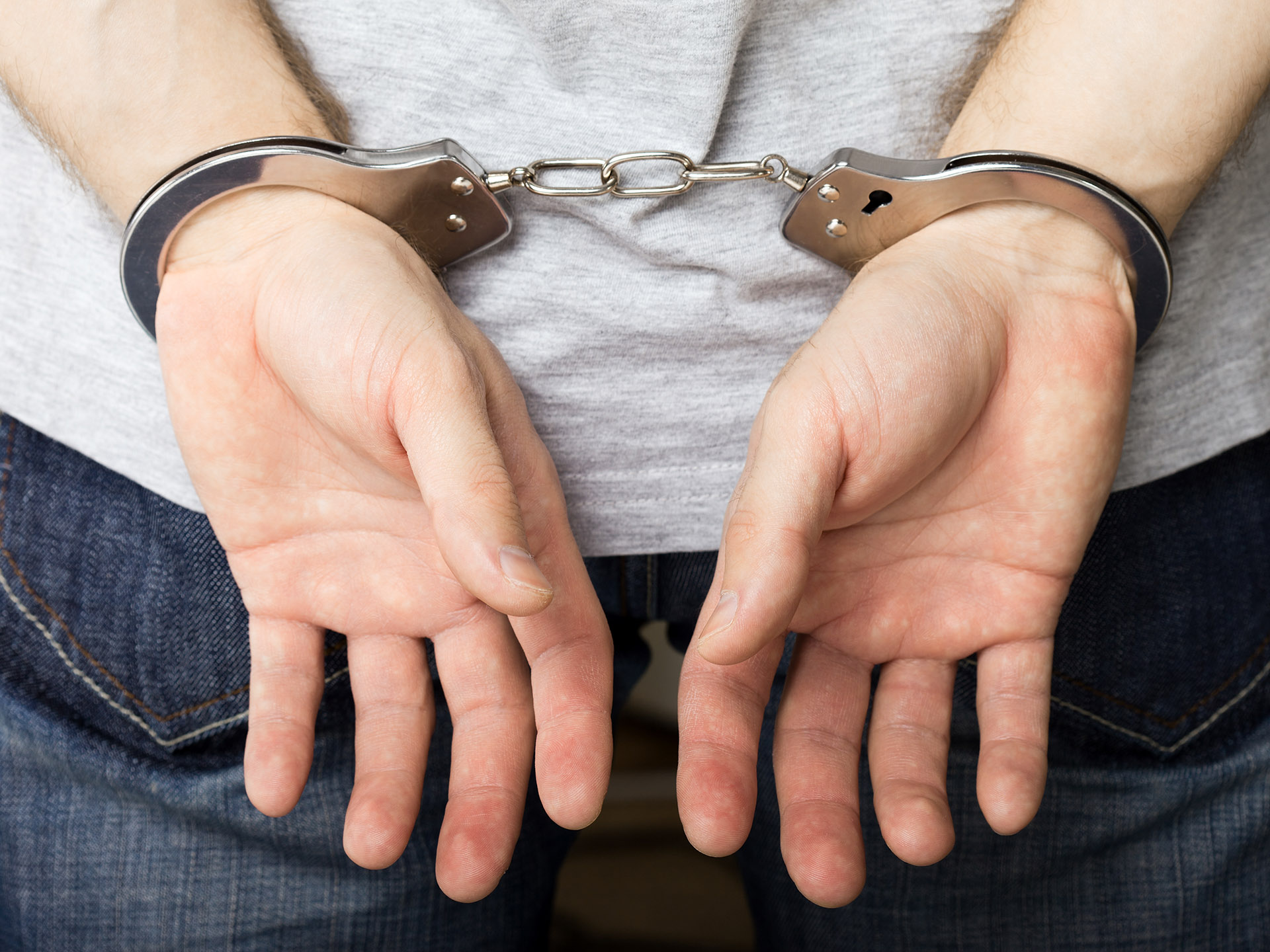 Arrested Man In Handcuffs